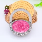 Folding table top bag holder images