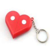 Heart shaped pill box with keychain images