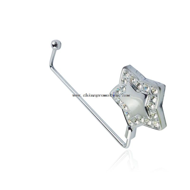 Metal table bag hook in Star Design