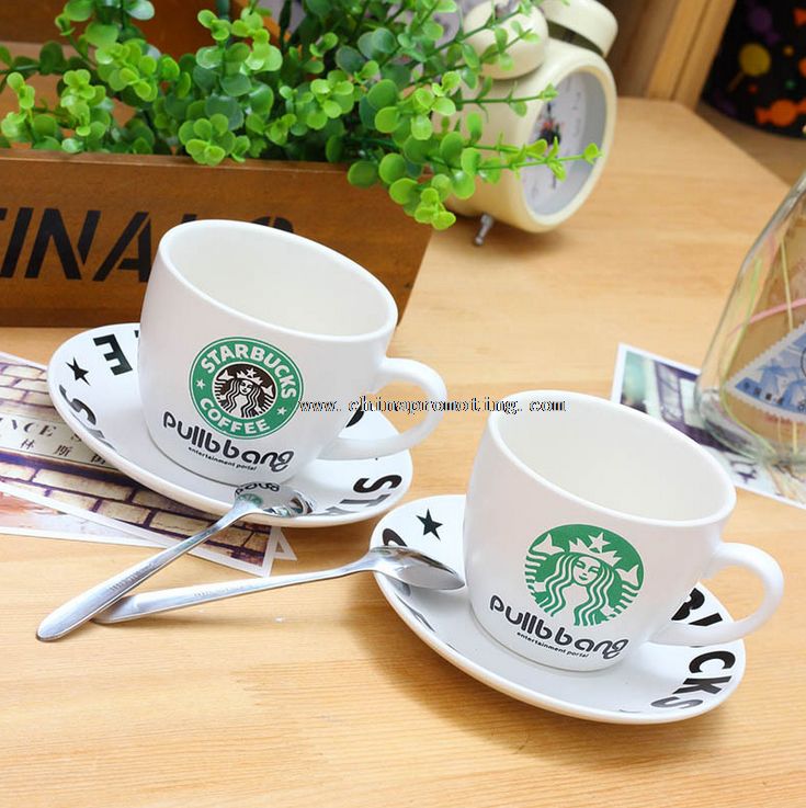 coffee mug with spoons and coaster