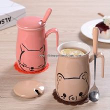 Cartoon ceramic cups with cover with a spoon images