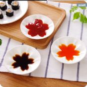 Piccoli piatti di ceramica del fiore di ciliegia images