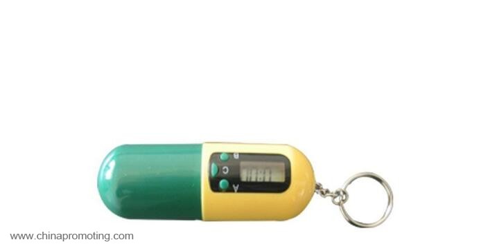 Capsule shape Timing Alarm Electronic Pill Box With Keychain