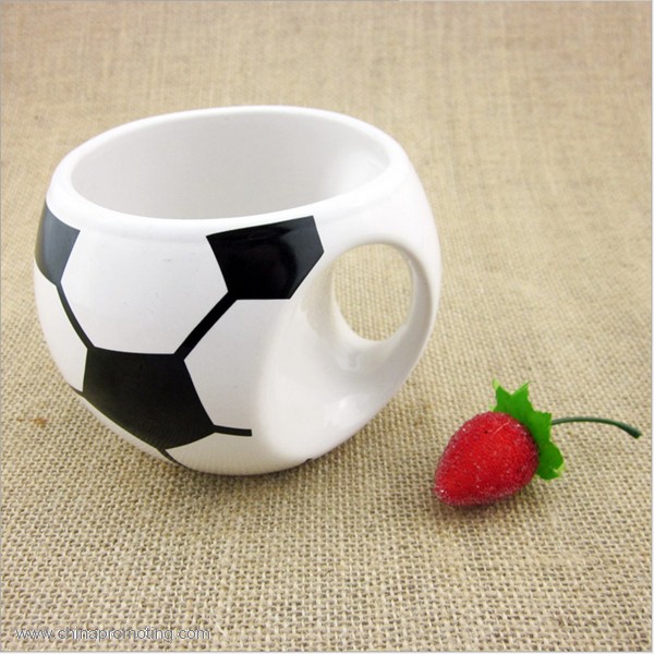 Cartoon football shaped ceramic coffee mug